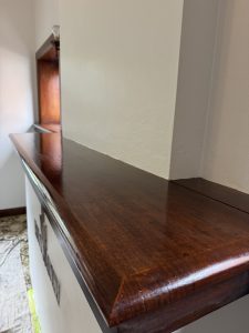 Timber stained fireplace mantle